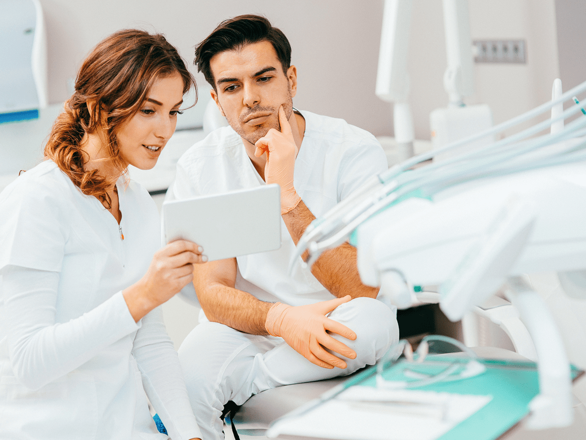 Dental professionals discussing treatment plan