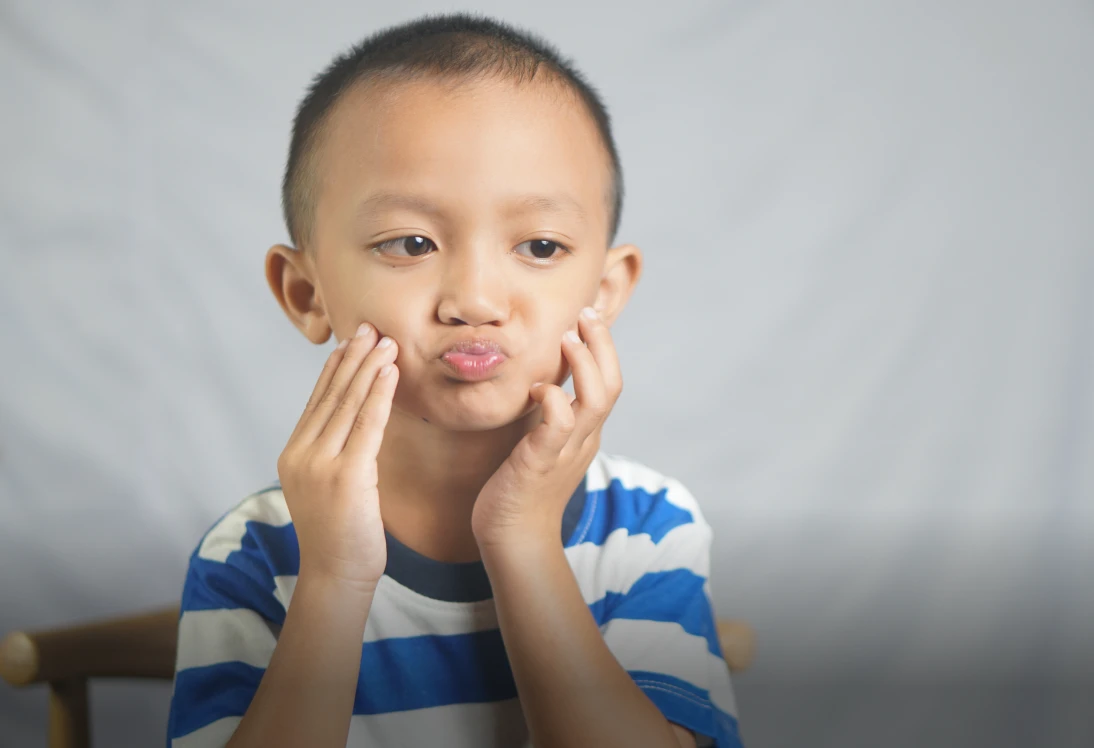 Child making a funny face